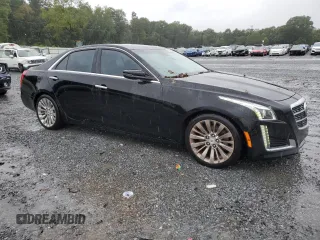 2014 Cadillac CTS Luxury RWD with VIN 1G6AR5SX4E0196780, listed as a Copart auction lot 68050504 with 83,140 mi miles and Salvage Title. Bid and sale history available at carsss.com. Image 4.