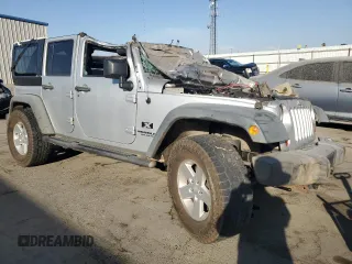 2008 Jeep Wrangler Unlimited X with VIN 1J4GB391X8L515128, listed as a Copart auction lot 74950764 with 188,884 mi miles and Salvage Title. Bid and sale history available at DreamBid. Image 4.