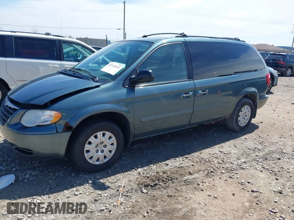 2005 Chrysler Town & Country LX with VIN 2C4GP44R75R267644, listed as a IAAI auction lot 42122611 with 107,802 mi miles and . Bid and sale history available at DreamBid. Image 2.