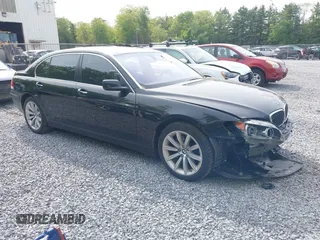 2007 BMW 7 Series 750Li z VIN WBAHN83597DT76996, wystawiony jako IAAI lot #42345377 z przebiegiem 151 480 mil mil oraz . Historia ofert i sprzedaży dostępna na DreamBid. Obrazek 1.