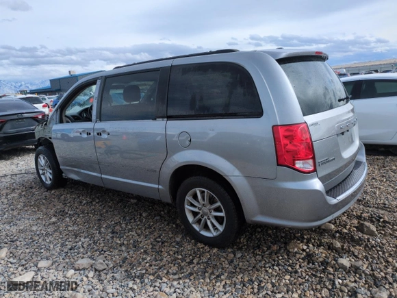 2013 Dodge Grand Caravan SXT with VIN 2C4RDGCG2DR686602, listed as a Copart auction lot 50064705 with 144,408 mi miles and Salvage Title. Bid and sale history available at carsss.com. Image 2.