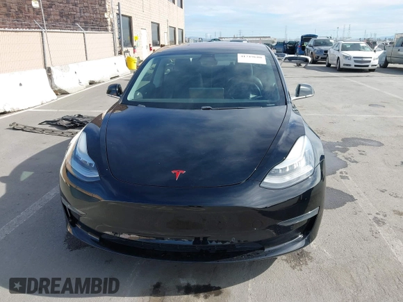 2019 Tesla Model 3 Mid Range with VIN 5YJ3E1EA2KF305834, listed as a IAAI auction lot 41719610 with 126,333 mi miles and . Bid and sale history available at DreamBid. Image 12.