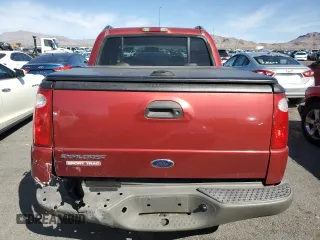 2002 Ford Explorer Sport Trac Value with VIN 1FMZU67E32UC52591, listed as a Copart auction lot 51298575 with 137,863 mi miles and Salvage title. Bid and sale history available at DreamBid. Image 6.