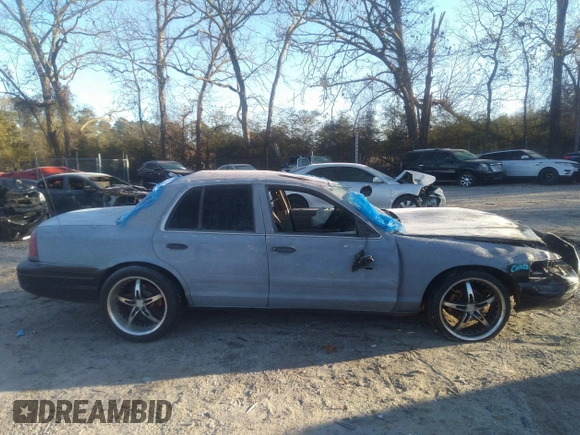 2005 Ford Police Interceptor with VIN 2FAFP71W25X138929, listed as a IAAI auction lot 41156277 with 186,991 mi miles and . Bid and sale history available at DreamBid. Image 14.