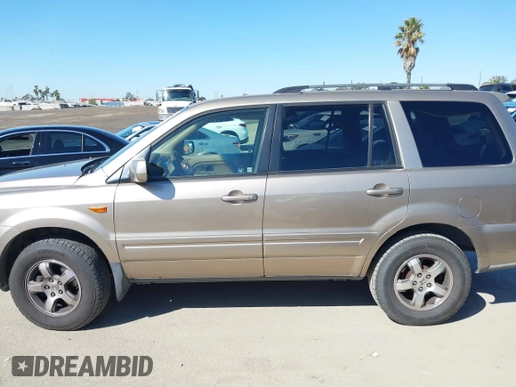 2006 Honda Pilot EX with VIN 5FNYF28416B017534, listed as a IAAI auction lot 41656789 with 241,343 mi miles and . Bid and sale history available at DreamBid. Image 14.