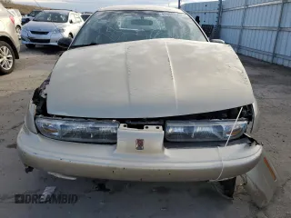 1997 Saturn SW z VIN 1G8ZK8276VZ295659, wystawiony jako Copart lot #47964235 z przebiegiem 122 219 mil mil oraz Szkody całkowita. Historia ofert i sprzedaży dostępna na DreamBid. Obrazek 5.