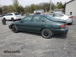 2001 Toyota Camry CE with VIN 4T1BG22K51U813533, listed as a Copart auction lot 53933705 with 200,769 mi miles and Salvage Title. Bid and sale history available at carsss.com. Image 2.