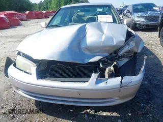 2001 Toyota Camry CE z VIN 4T1BG22K01U053432, wystawiony jako IAAI lot #42257822 z przebiegiem 128 610 mil mil oraz . Historia ofert i sprzedaży dostępna na DreamBid. Obrazek 18.