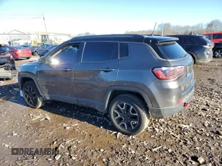 2019 Jeep Compass Trailhawk with VIN 3C4NJDDB5KT775860, listed as a Copart auction lot 48113695 with 76,091 mi miles and Salvage Title. Bid and sale history available at DreamBid. Image 2.