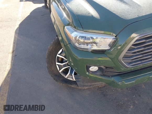 2021 Toyota Tacoma SR with VIN 3TYCZ5AN2MT039450, listed as a IAAI auction lot 40457613 with 54,176 mi miles and . Bid and sale history available at DreamBid. Image 11.