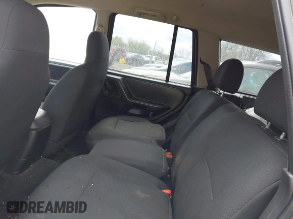 2003 Jeep Grand Cherokee Laredo with VIN 1J4GW48S63C591605, listed as a IAAI auction lot 41973681 with 177,024 mi miles and . Bid and sale history available at DreamBid. Image 8.