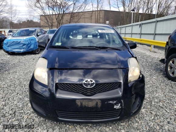 2009 Toyota Yaris with VIN JTDKT903395225334, listed as a Copart auction lot 50764035 with 117,561 mi miles and Clean Title. Bid and sale history available at carsss.com. Image 5.