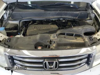 2014 Honda Pilot Touring z VIN 5FNYF4H99EB011079, wystawiony jako Copart lot #57869765 z przebiegiem Nie podano mil oraz Szkoda całkowita • Salvage title. Historia ofert i sprzedaży dostępna na DreamBid. Obrazek 12.