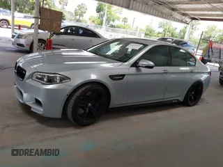 2014 BMW M5 z VIN WBSFV9C57ED097794, wystawiony jako IAAI lot #42257563 z przebiegiem 120 933 mil mil oraz . Historia ofert i sprzedaży dostępna na DreamBid. Obrazek 14.