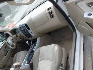 2005 Mercury Mariner Luxury with VIN 4M2CU57165DJ33059, listed as a IAAI auction lot 41675851 with 222,375 mi miles. Bid and sale history available at carsss.com. Image 5.