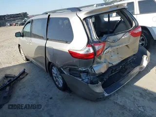 2015 Toyota Sienna XLE with VIN 5TDYK3DC0FS632909, listed as a IAAI auction lot 42012143 with 97,084 mi miles and . Bid and sale history available at DreamBid. Image 3.