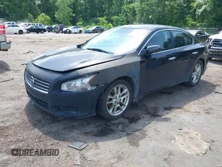 2011 Nissan Maxima SV with VIN 1N4AA5AP5BC841586, listed as a IAAI auction lot 42162383 with 412,977 mi miles and . Bid and sale history available at DreamBid. Image 2.