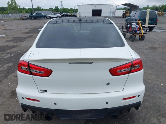 2013 Mitsubishi Lancer Evolution GSR z VIN JA32W8FV0DU023509, wystawiony jako IAAI lot #42222552 z przebiegiem 128 030 mil mil oraz . Historia ofert i sprzedaży dostępna na DreamBid. Obrazek 16.