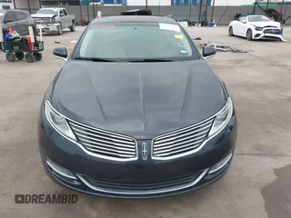2014 Lincoln MKZ z VIN 3LN6L2G98ER830388, wystawiony jako IAAI lot #42104116 z przebiegiem 108 219 mil mil oraz . Historia ofert i sprzedaży dostępna na DreamBid. Obrazek 13.