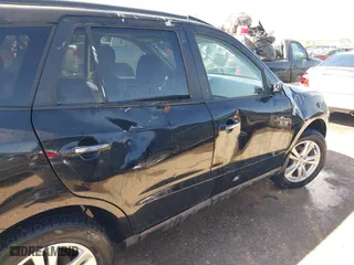 2012 Hyundai Santa Fe Limited with VIN 5XYZK3AB1CG120312, listed as a IAAI auction lot 41855080 with 143,783 mi miles. Bid and sale history available at carsss.com. Image 6.