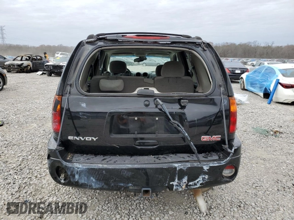2006 GMC Envoy SLT with VIN 1GKDS13SX62354690, listed as a Copart auction lot 84138814 with 194,669 mi miles and Salvage Title. Bid and sale history available at carsss.com. Image 6.