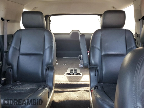 2013 GMC Yukon Denali with VIN 1GKS2EEF0DR311141, listed as a Copart auction lot 74823594 with 125,580 mi miles and Salvage Title. Bid and sale history available at carsss.com. Image 10.