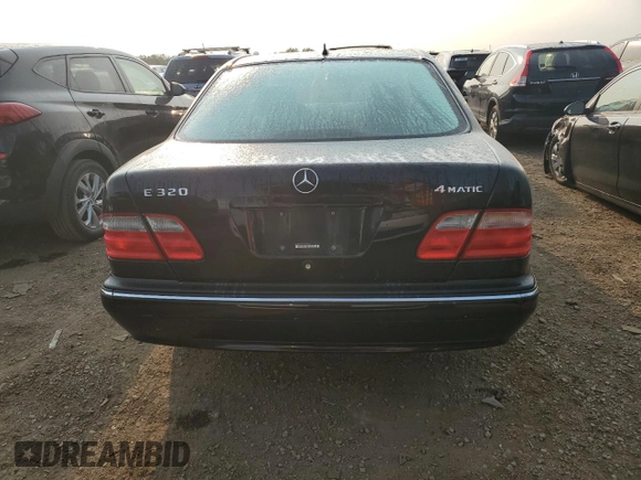 2000 Mercedes-Benz E-Class with VIN WDBJF82J4YX042051, listed as a Copart auction lot 72147904 with 265,886 mi miles and Salvage Title. Bid and sale history available at carsss.com. Image 6.