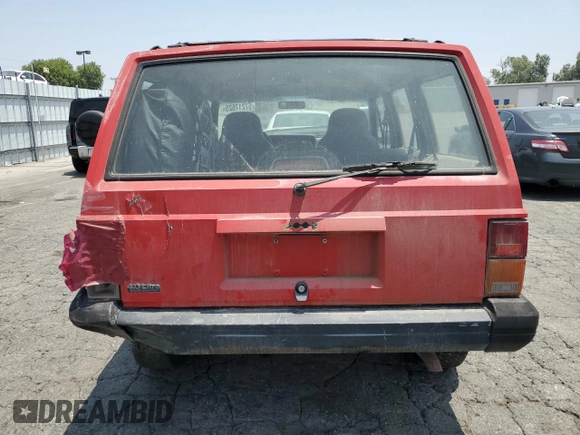 1996 Jeep Cherokee SE with VIN 1J4FT28S3TL213153, listed as a Copart auction lot 57217625 with 331,741 mi miles and Salvage title. Bid and sale history available at DreamBid. Image 6.