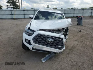 2022 Toyota Tacoma SR с VIN 3TMCZ5AN0NM468020, выставлен на аукционе Copart как лот 58708235 с пробегом 112 523 миль миль и На запчасти • Non repairable. История ставок и продаж доступна на DreamBid. Изображение 5.