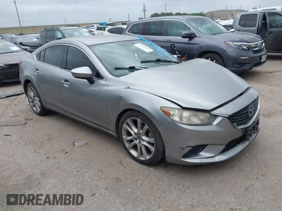 2014 Mazda Mazda6 i Touring with VIN JM1GJ1V59E1105417, listed as a IAAI auction lot 41963071 with 167,985 mi miles. Bid and sale history available at carsss.com. Image 1.