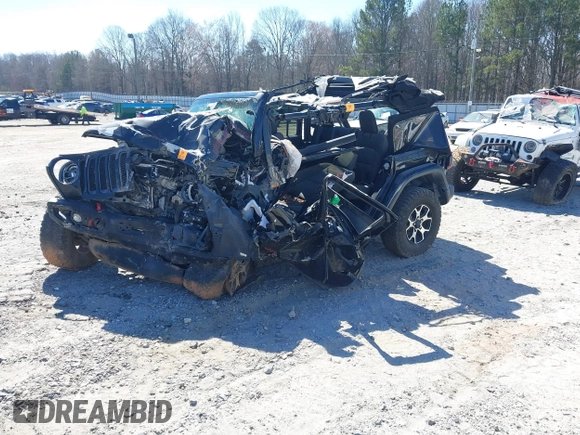 2020 Jeep Wrangler Unlimited Rubicon with VIN 1C4HJXFG2LW147242, listed as a IAAI auction lot 41630952 with Not provided miles and . Bid and sale history available at DreamBid. Image 2.