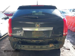 2014 Cadillac SRX Premium Collection z VIN 3GYFNDE34ES581728, wystawiony jako IAAI lot #41578226 z przebiegiem 121 118 mil mil oraz . Historia ofert i sprzedaży dostępna na DreamBid. Obrazek 17.