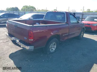 1997 Ford F-150 Standard with VIN 1FTDF1728VKC04974, listed as a IAAI auction lot 41969225 with 159,375 mi miles. Bid and sale history available at carsss.com. Image 4.