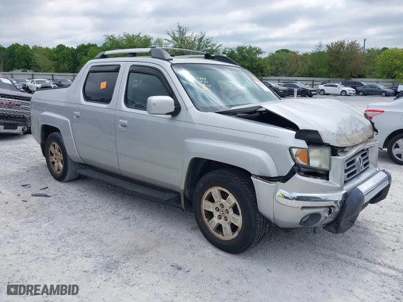 2008 Honda Ridgeline RTL with VIN 2HJYK16568H527114, listed as a IAAI auction lot 42042902 with 127,159 mi miles. Bid and sale history available at carsss.com. Image 1.