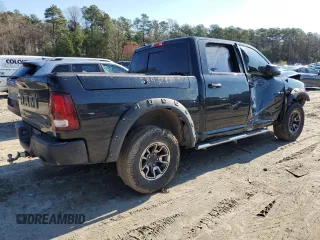 2015 Ram 1500 Rebel z VIN 1C6RR7YT7FS771791, wystawiony jako Copart lot #49873094 z przebiegiem 119 875 mil mil oraz Szkoda całkowita • Salvage title. Historia ofert i sprzedaży dostępna na DreamBid. Obrazek 3.