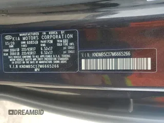 2021 Kia Sedona LX with VIN KNDMB5C17M6665266, listed as a Copart auction lot 48129495 with 57,274 mi miles and Salvage Title. Bid and sale history available at carsss.com. Image 15.