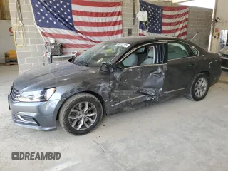 2017 Volkswagen Passat S with VIN 1VWAT7A36HC077623, listed as a Copart auction lot 60415295 with 67,036 mi miles and Salvage title. Bid and sale history available at DreamBid. Image 1.
