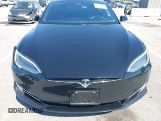 2017 Tesla Model S 100D with VIN 5YJSA1E21HF202591, listed as a IAAI auction lot 41983073 with 140,282 mi miles and . Bid and sale history available at DreamBid. Image 12.