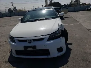 2013 Scion tC z VIN JTKJF5C77D3063067, wystawiony jako Copart lot #54264625 z przebiegiem 74 351 mil mil oraz Szkoda całkowita • Salvage title. Historia ofert i sprzedaży dostępna na DreamBid. Obrazek 13.