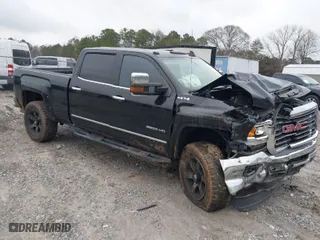 2018 GMC Sierra 2500HD SLT with VIN 1GT12TEY9JF279932, listed as a IAAI auction lot 41583208 with 70,465 mi miles. Bid and sale history available at carsss.com. Image 1.