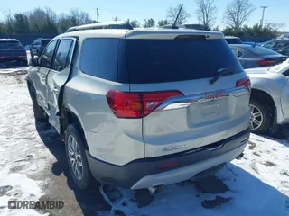 2017 GMC Acadia SLE with VIN 1GKKNLLS4HZ204420, listed as a IAAI auction lot 41597516 with 87,020 mi miles. Bid and sale history available at carsss.com. Image 3.