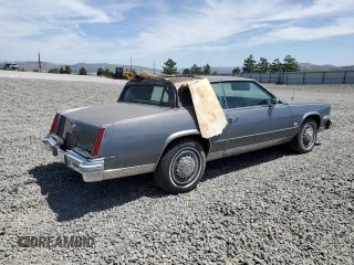 1980 Cadillac Eldorado z VIN 6L578AE609480, wystawiony jako Copart lot #58422345 z przebiegiem 85 604 mil mil oraz Tytuł czysty. Historia ofert i sprzedaży dostępna na DreamBid. Obrazek 3.