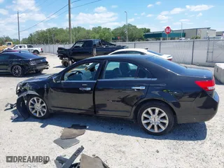 2011 Lincoln MKZ with VIN 3LNHL2GC9BR763431, listed as a IAAI auction lot 42037377 with 331,415 mi miles. Bid and sale history available at carsss.com. Image 14.