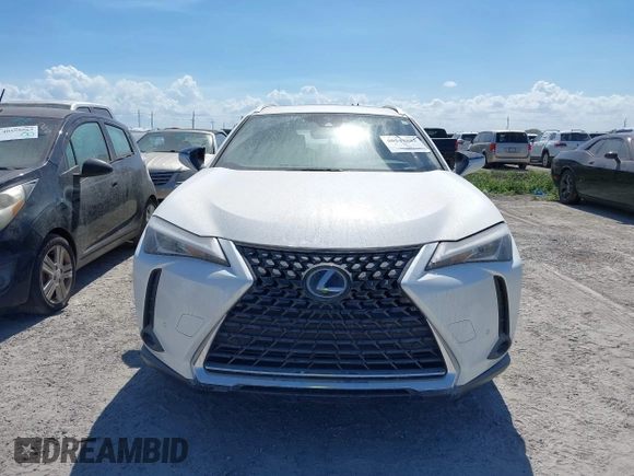 2021 Lexus UX with VIN JTHP9JBH4M2044900, listed as a IAAI auction lot 40543882 with 1 mi miles. Bid and sale history available at carsss.com. Image 13.