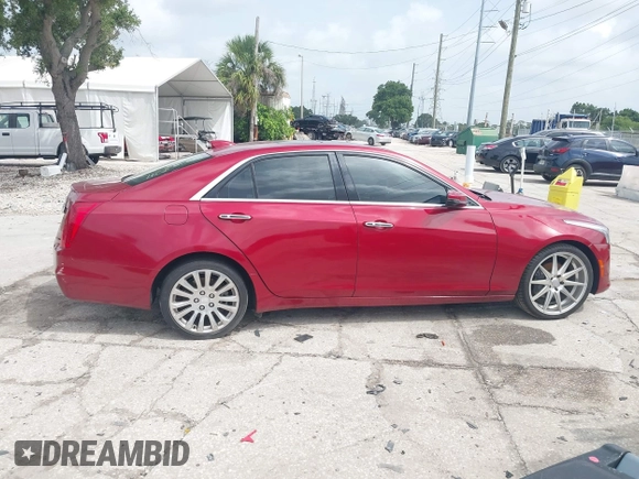 2015 Cadillac CTS Luxury AWD with VIN 1G6AX5SX2F0112852, listed as a IAAI auction lot 42398611 with 70,253 mi miles and . Bid and sale history available at DreamBid. Image 13.