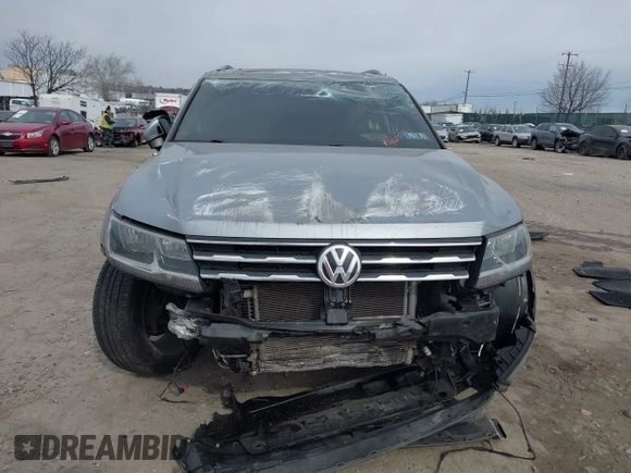 2020 Volkswagen Tiguan SE with VIN 3VV2B7AX6LM026760, listed as a IAAI auction lot 41652292 with 63,925 mi miles and . Bid and sale history available at DreamBid. Image 6.