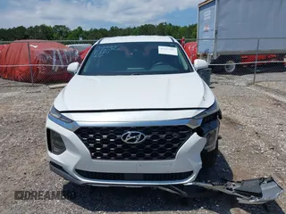 2019 Hyundai Santa Fe SE with VIN 5NMS23AD0KH013811, listed as a IAAI auction lot 42337926 with 87,000 mi miles and . Bid and sale history available at DreamBid. Image 12.