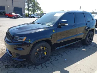 2020 Jeep Grand Cherokee Trackhawk with VIN 1C4RJFN96LC336561, listed as a IAAI auction lot 41991800 with 58,781 mi miles and . Bid and sale history available at DreamBid. Image 17.