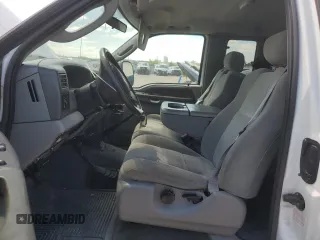 2004 Ford F-250 XL with VIN 1FTNX21P04EA92082, listed as a Copart auction lot 55311935 with 217,363 mi miles and Salvage title. Bid and sale history available at DreamBid. Image 7.