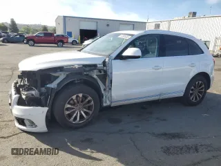 2014 Audi Q5 Premium Plus with VIN WA1LFAFP2EA107648, listed as a Copart auction lot 52895005 with 121,787 mi miles and Salvage title. Bid and sale history available at DreamBid. Image 1.